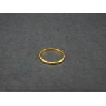 A 22ct. hallmarked gold band ring, size L, weight 1.4g approx.