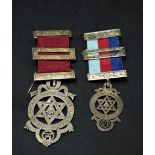 Two silver gilt Masonic jewels with ribbons and bars.