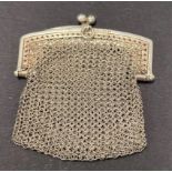 A silver hallmarked mesh coin purse, London 1923, width 6cm, weight 1oz approx.