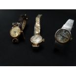 A 9ct. gold cased ladies manual wind wristwatch, the dial signed Regency Seventeen Jewels,