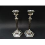 A modern pair of hexagonal section weighted candlesticks, maker S & M, Birmingham 1962, height 18cm,