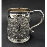 A George II silver mug, foliate scroll engraved and chased and with armorial, maker's mark W.F.,