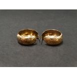 A pair of 9ct. hallmarked gold hoop earrings with leaf decoration, weight 6.4g approx.
