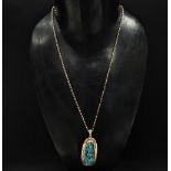 A 9ct. gold turquoise set pendant necklace, weight of chain 5.3g, weight of pendant 11.5g approx.