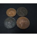 A Victoria 1858 bun head penny, a 1858 half penny and two Victoria 1d copper pennies, 1864 and