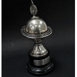 An unusual silver trophy in the form of a globe, upon black socle, Birmingham 1951, height 18cm.