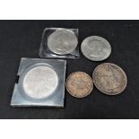 A George V Indian One rupee 1919 silver coin, together with a South Africa 1948 5 shilling coin