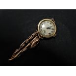 A 9ct. gold ladies bracelet wristwatch, the 18mm white dial with Roman numerals, subsidiary