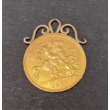 An Edward VII 1908 9ct. gold mounted half sovereign pendant, weight 4.4g approx.