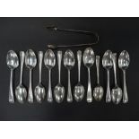 A Victorian silver set of twelve Old English Beaded pattern teaspoons, together with sugar tongs,