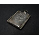 An unusual Edwardian silver fob two section stamp box, each side with a sliding font, one side