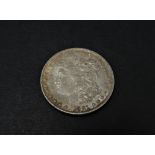 A USA Morgan dollar 1881 silver coin.