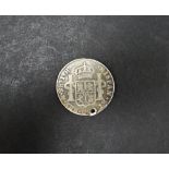 A Mexican 2 reales 1809 silver coin, drilled.