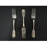 A set of three Victorian silver Fiddle pattern table forks by George Aldwinckle, London 1856 and