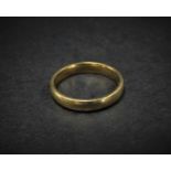 A 9ct. hallmarked gold band ring, size U, weight 4.8g approx.