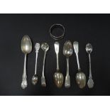 A set of three George III silver Fiddle and Shell pattern teaspoons, maker GD, London 1810, together