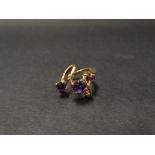 A good 9ct hallmarked gold three stone amethyst set ring by Bernard Instone, hallmarked Birmingham