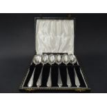 A cased set of six silver grapefruit spoons, Birmingham 1955, weight 3.75oz approx.