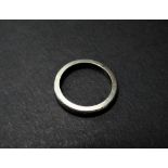 An 18ct. white gold band ring, size M, weight 4.8g approx.
