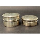 A George V silver engine turned circular lidded pin box, together with matching powder box, maker