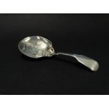A George IV silver caddy spoon by George Wintle, the bowl with foliate bright cut decoration, London