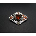 A Scottish silver stone set brooch set with a large central cut citrine, width 55mm, weight 18.5g