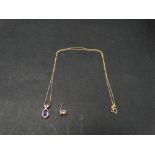 A 10k gold amethyst set pendant necklace, together with one matching earrings, weight 1g approx.