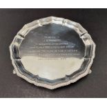 A Victorian silver card tray with pie crust edge and gadrooned edge, engraved dedication, raised