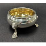 A George II silver salt raised on three outswept feet, indistinct maker DA?, London 1745, diameter