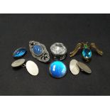 A silver and marcasite stone set brooch, stamped Sterling Silver, together with two butterfly wing