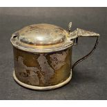 A Victorian silver hinge lidded mustard pot with blue glass liner, maker W.W., Birmingham 1901,