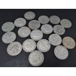 A collection of nineteen George V & VI .500 silver half crown coins, weight 267g approx.