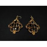 A pair of modern 9ct. hallmarked gold Victorian style drop earrings, each set with four stones,