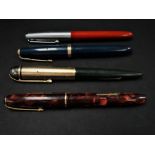 Four vintage fountain pens with 14k gold nibs, Conway Stewart, Parker Duafold, Eversharp and