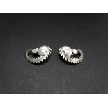 A pair of Georg Jensen sterling silver clip earrings, pattern No.112, stamped marks, weight 7.7g
