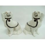 A pair of Victorian Staffordshire Pottery opposing spaniels, height 23cm.