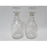 A pair of 19th century cut glass decanters and stoppers, height 28cm.