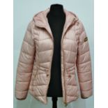 A contemporary Barbour International ladies pink fibredown quilt jacket, LQU1139P134, UK size 10