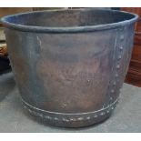 A massive 19th century copper washer pot of riveted construction, diameter 83cm.