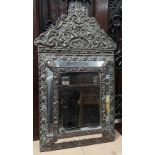 A late 19th century brass decorated Dutch style wall mirror, height 59cm.