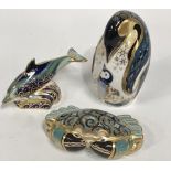 Three modern Royal Crown Derby Imari paperweights, one in the form of a crab, the other a penguin