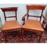 A set of twelve William IV style bar back dining chairs with mahogany frames and overstuffed seats