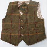 A modern child's tweed waistcoat by Shire Classics.