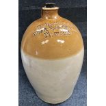 An advertising stoneware flagon by Price of Bristol and stamped Richard Hicks Wine & Spirit Merchant