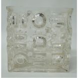 A mid 20th century clear moulded glass square section vase, height 17cm.
