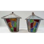 A pair of leaded stained glass hall lanterns, height 24cm (one misshapen).