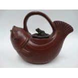 A Chinese Yixing teapot modelled as a fish, the lid as a frog on a lily pad, seal mark to the