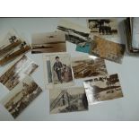 A quantity of loose postcards, mostly of topographical interest, including Cornwall and Isles of