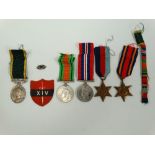 A WWII group of four medals awarded to Sergeant W.J.H. Chin T-80883 Royal Army Service Corps,