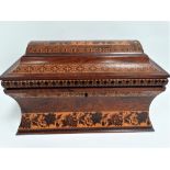 A 19th century Tunbridge Ware rosewood inlaid sarcophagus form hinge lidded box, decorated with
